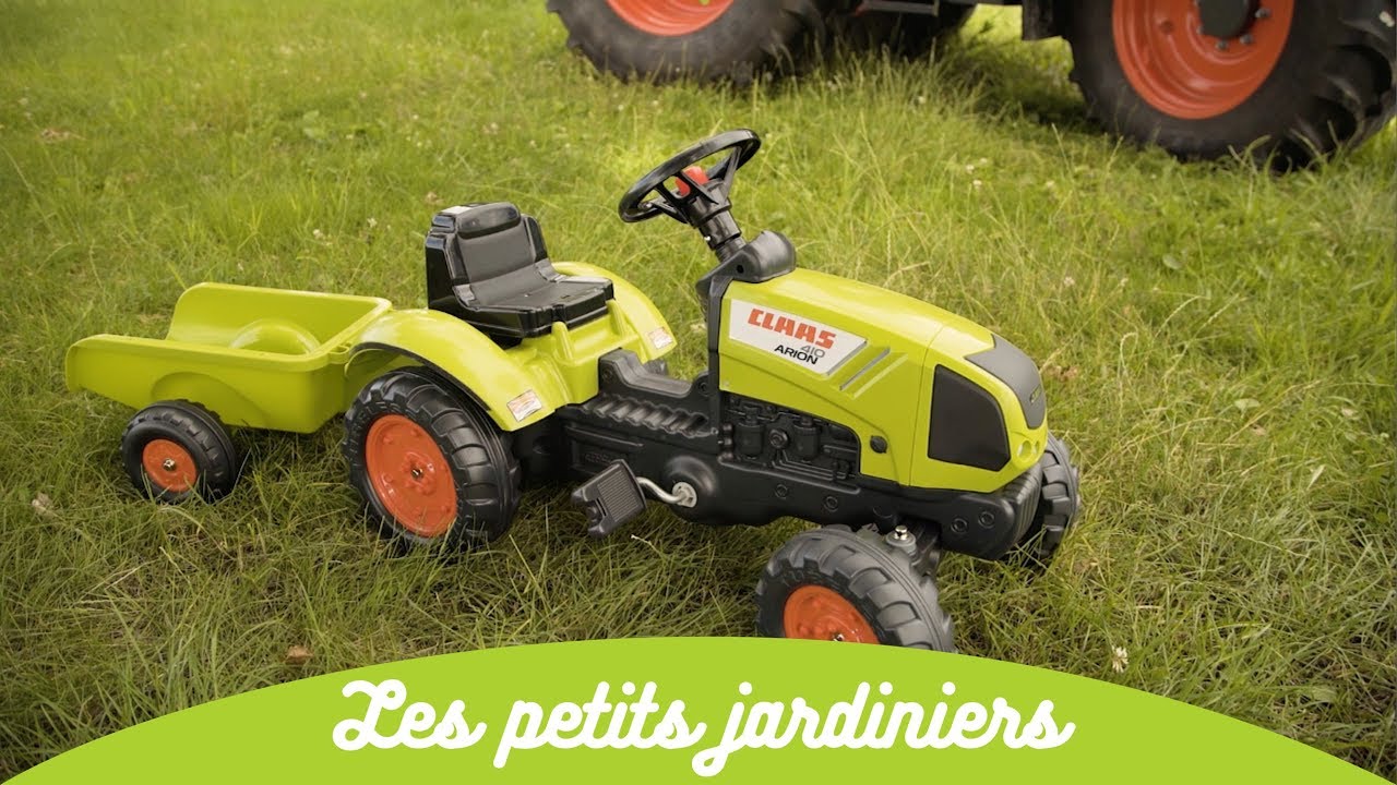 Grøn Claas Arion 410 pedaltraktor med tipbar frontlæsser og tilhørende vogn, sikkerhedsbøjle og robuste hjul - perfekt lege- og transporttraktor til børn 2-5 år (FALK)