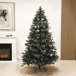 Kunstigt juletræ med LED-lys på metalfod Grønt kunstigt juletræ med hvide LED-lys indendørs