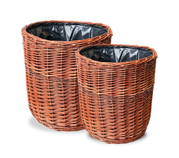 To runde flettede papirkurve i pil med plastpose