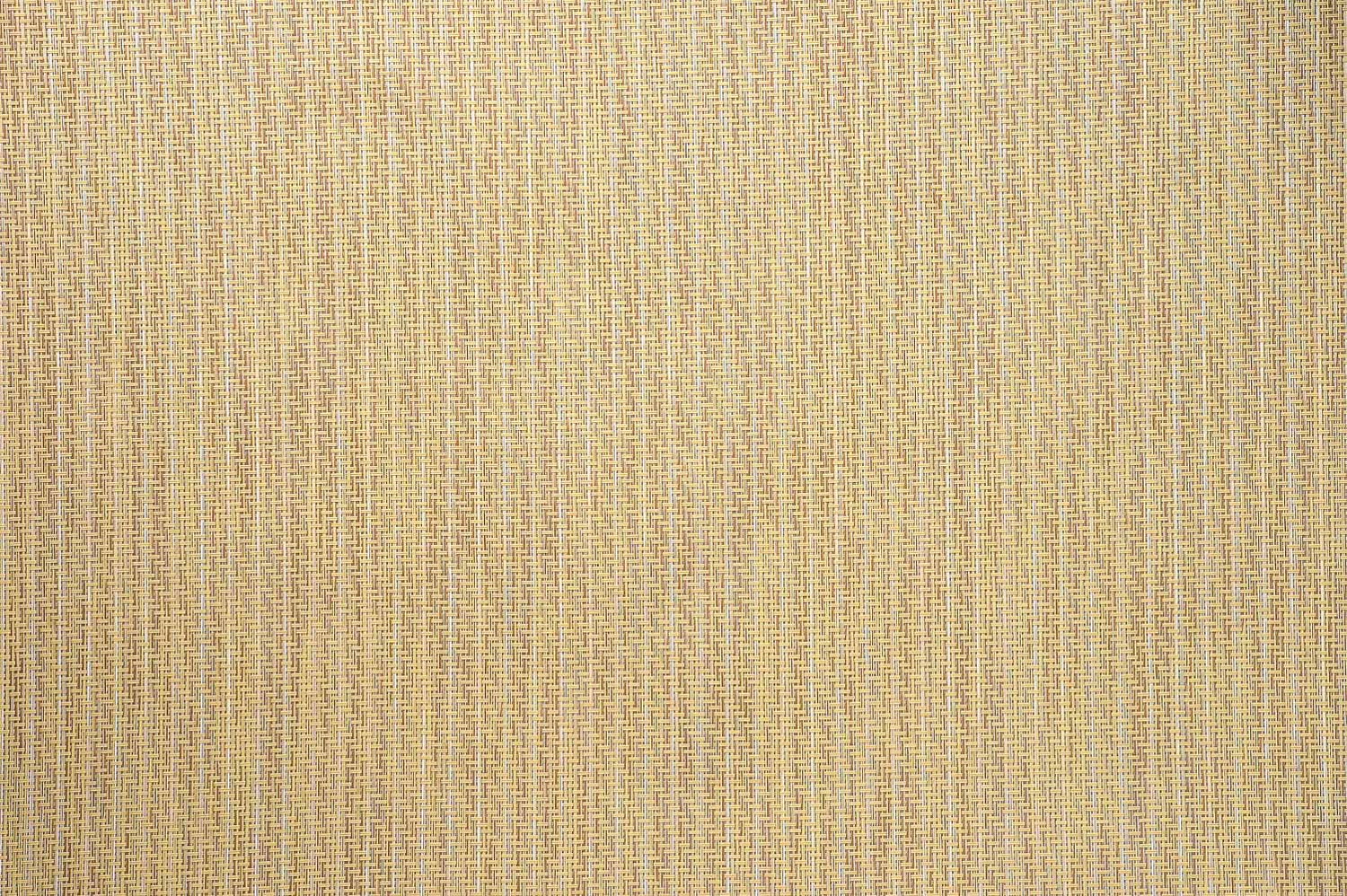 Beige vævet tekstil med struktur Nærbillede af beige vævet stof med fin struktur