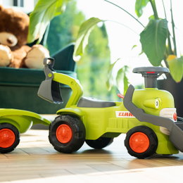 FALK Claas vintage traktor til børn med rat, horn, frontlæsser, gravemaskine og aftagelig trailer Grøn Claas vintage legetraktor fra FALK med rat, horn, frontlæsser, gravemaskine og aftagelig trailer – robust første arbejdsmaskine til børn 1–3 år