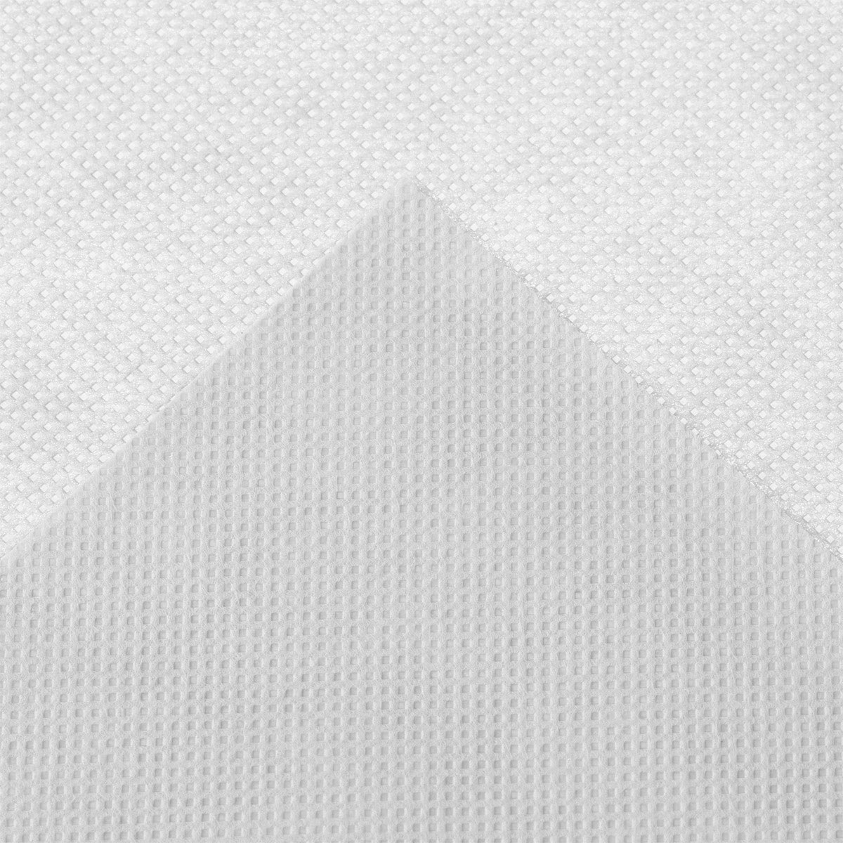 Hvidt nonwoven stof med struktur Nærbillede af hvidt nonwoven stof med mønster