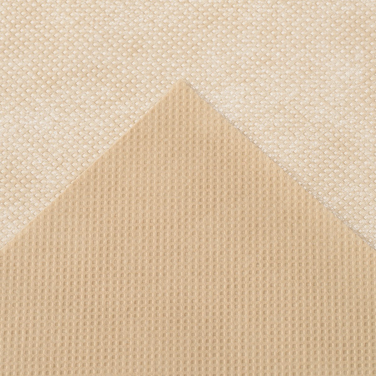 Beige tekstil med skridsikker netstruktur